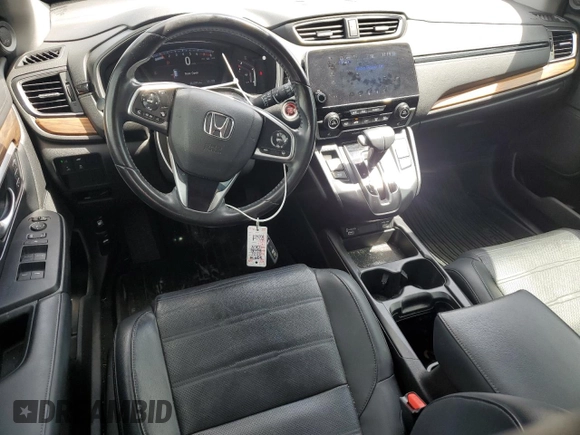 2021 Honda CR-V EX-L с VIN 5J6RW1H82MA002557, выставлен на аукционе Copart как лот 60217005 с пробегом 61 397 миль миль и Списание • Salvage title. История ставок и продаж доступна на DreamBid. Изображение 8.