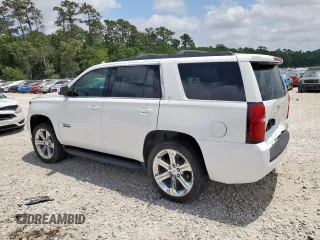 2019 Chevrolet Tahoe LT with VIN 1GNSCBKC1KR226315, listed as a Copart auction lot 57215915 with 153,170 mi miles and Salvage title. Bid and sale history available at DreamBid. Image 2.