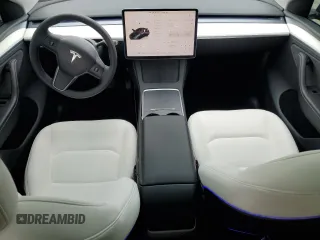 2024 Tesla Model Y Long Range with VIN 7SAYGDEE0RA255613, listed as a Copart auction lot 58993085 with 39,336 mi miles and Salvage title. Bid and sale history available at DreamBid. Image 8.