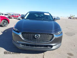 2022 Mazda CX-30 S Select z VIN 3MVDMBBL0NM415511, wystawiony jako IAAI lot #41513247 z przebiegiem Nie podano mil oraz . Historia ofert i sprzedaży dostępna na DreamBid. Obrazek 13.