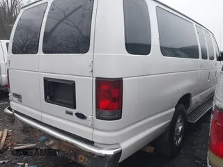 2013 Ford Econoline Passenger XL with VIN 1FBSS3BL7DDA58301, listed as a IAAI auction lot 41462883 with 185,987 mi miles and . Bid and sale history available at DreamBid. Image 4.
