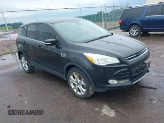 2013 Ford Escape SEL z VIN 1FMCU9H92DUD11304, wystawiony jako IAAI lot #42546315 z przebiegiem 189 486 mil mil oraz . Historia ofert i sprzedaży dostępna na DreamBid. Obrazek 1.