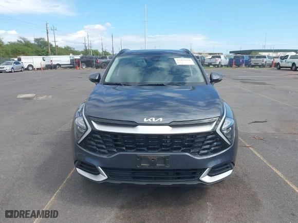 2023 Kia Sportage Hybrid EX with VIN KNDPVCAG5P7020209, listed as a IAAI auction lot 41409698 with 67,953 mi miles. Bid and sale history available at carsss.com. Image 13.