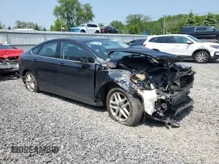 2013 Ford Fusion SE with VIN 3FA6P0HR5DR335940, listed as a Copart auction lot 60004085 with 112,239 mi miles and Salvage title. Bid and sale history available at DreamBid. Image 4.