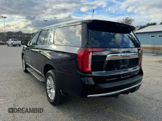 2021 GMC Yukon XL SLT with VIN 1GKS2GKDXMR238116, listed as a Copart auction lot 83266714 with 106,975 mi miles and Clean Title. Bid and sale history available at carsss.com. Image 3.