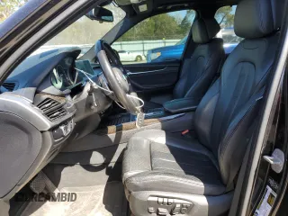 2014 BMW X5 xDrive50i with VIN 5UXKR6C51E0J73170, listed as a Copart auction lot 49260175 with 129,625 mi miles and Salvage Title. Bid and sale history available at carsss.com. Image 7.
