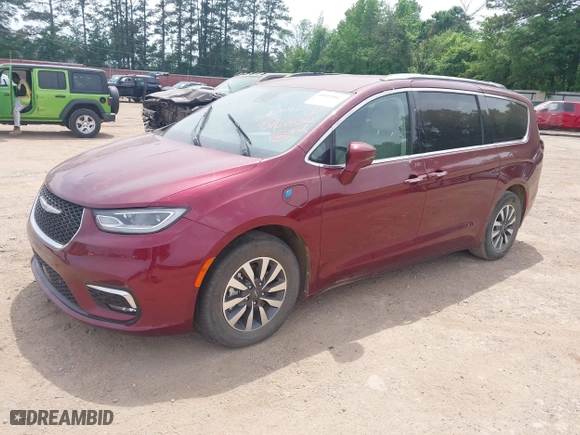 2021 Chrysler Pacifica Hybrid Touring L with VIN 2C4RC1L78MR603108, listed as a IAAI auction lot 40112042 with 56,674 mi miles. Bid and sale history available at carsss.com. Image 18.