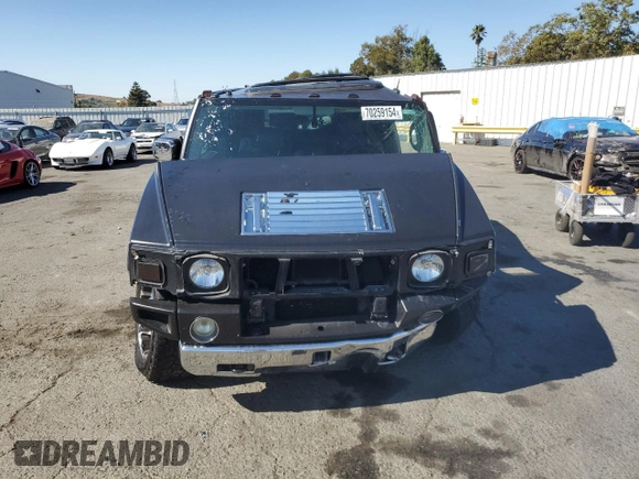 2003 Hummer H2 with VIN 5GRGN23U83H134284, listed as a Copart auction lot 70259154 with 0 mi miles and Salvage Title. Bid and sale history available at carsss.com. Image 5.