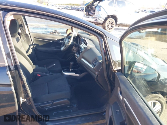 2019 Honda Fit LX with VIN 3HGGK5H46KM735161, listed as a IAAI auction lot 41338424 with 59,260 mi miles. Bid and sale history available at carsss.com. Image 5.