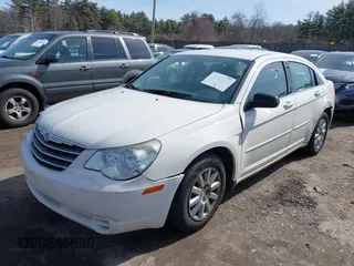 2010 Chrysler Sebring Touring with VIN 1C3CC4FB3AN153906, listed as a IAAI auction lot 41927843 with 131,079 mi miles and . Bid and sale history available at DreamBid. Image 2.