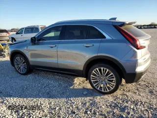 2024 Cadillac XT4 FWD Premium Luxury with VIN 1GYFZCR47RF213944, listed as a Copart auction lot 87674675 with 1,606 mi miles and Salvage title. Bid and sale history available at DreamBid. Image 2.