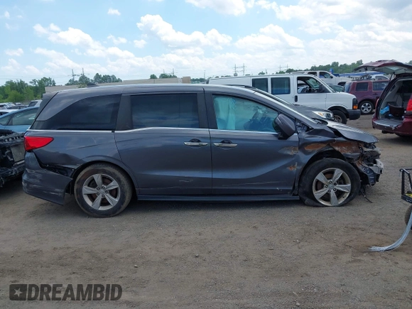 2020 Honda Odyssey EX with VIN 5FNRL6H54LB025555, listed as a IAAI auction lot 42512480 with 95,425 mi miles and . Bid and sale history available at DreamBid. Image 13.