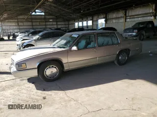 1990 Cadillac DeVille z VIN 1G6CD5334L4365012, wystawiony jako Copart lot #44241315 z przebiegiem 100 948 mil mil oraz Szkoda całkowita • Salvage title. Historia ofert i sprzedaży dostępna na DreamBid. Obrazek 1.