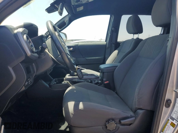 2019 Toyota Tacoma SR with VIN 3TMCZ5AN2KM277551, listed as a Copart auction lot 61586585 with 59,670 mi miles and Salvage title. Bid and sale history available at DreamBid. Image 7.