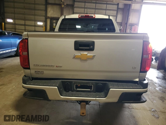 2019 Chevrolet Colorado 4WD LT with VIN 1GCGTCEN8K1107631, listed as a Copart auction lot 52574065 with 86,874 mi miles and Salvage title. Bid and sale history available at DreamBid. Image 6.
