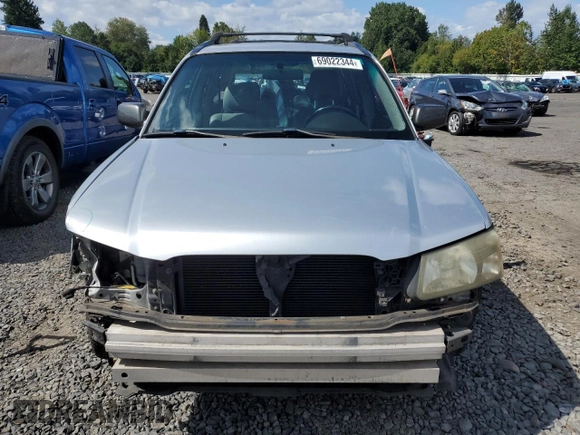 2003 Subaru Forester XS with VIN JF1SG65663H755380, listed as a Copart auction lot 69022344 with 148,658 mi miles and Salvage Title. Bid and sale history available at carsss.com. Image 5.