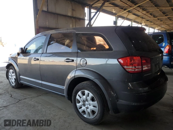 2014 Dodge Journey American Value with VIN 3C4PDCAB2ET301688, listed as a Copart auction lot 54731275 with 108,064 mi miles and Salvage Title. Bid and sale history available at DreamBid. Image 2.