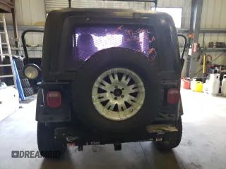 2004 Jeep Wrangler Sport z VIN 1J4FA49S44P746039, wystawiony jako Copart lot #51982795 z przebiegiem Nie podano mil oraz Czysty tytuł • Clean title. Historia ofert i sprzedaży dostępna na DreamBid. Obrazek 6.