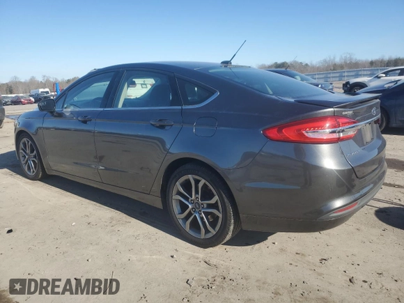 2017 Ford Fusion S with VIN 3FA6P0G76HR201606, listed as a Copart auction lot 41729265 with 124,475 mi miles and Salvage Title. Bid and sale history available at DreamBid. Image 2.