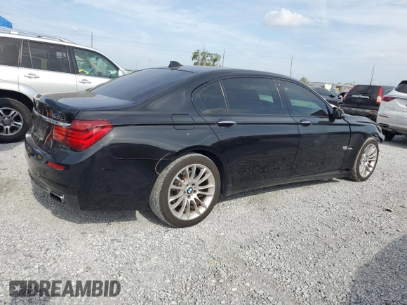 2014 BMW 7 Series 740Li with VIN WBAYE4C52ED138770, listed as a Copart auction lot 53647665 with 106,827 mi miles and Salvage title. Bid and sale history available at DreamBid. Image 3.