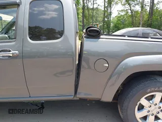 2012 GMC Canyon SLE2 z VIN 1GTJ6PFE2C8128602, wystawiony jako IAAI lot #42421110 z przebiegiem 79 273 mil mil oraz . Historia ofert i sprzedaży dostępna na DreamBid. Obrazek 6.