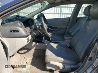 2012 Honda Insight EX z VIN JHMZE2H76CS001683, wystawiony jako Copart lot #49061885 z przebiegiem 259 158 mil mil oraz Szkoda całkowita • Salvage title. Historia ofert i sprzedaży dostępna na DreamBid. Obrazek 7.