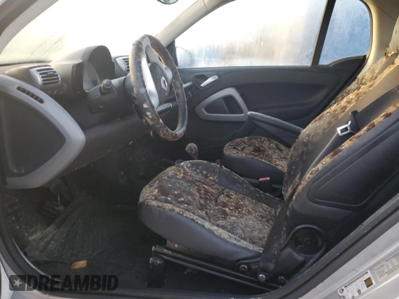 2010 Smart fortwo Pure with VIN WMEEJ3BA6AK358740, listed as a Copart auction lot 76438034 with Not provided miles and Non repairable. Bid and sale history available at DreamBid. Image 7.