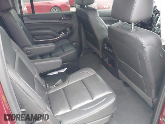 2020 Chevrolet Suburban LT z VIN 1GNSCHKC9LR233596, wystawiony jako IAAI lot #41943325 z przebiegiem 97 515 mil mil oraz . Historia ofert i sprzedaży dostępna na DreamBid. Obrazek 8.