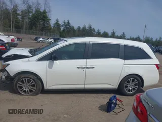 2012 Honda Odyssey EX-L with VIN 5FNRL5H65CB082916, listed as a IAAI auction lot 42052713 with 217,267 mi miles and . Bid and sale history available at carsss.com. Image 15.