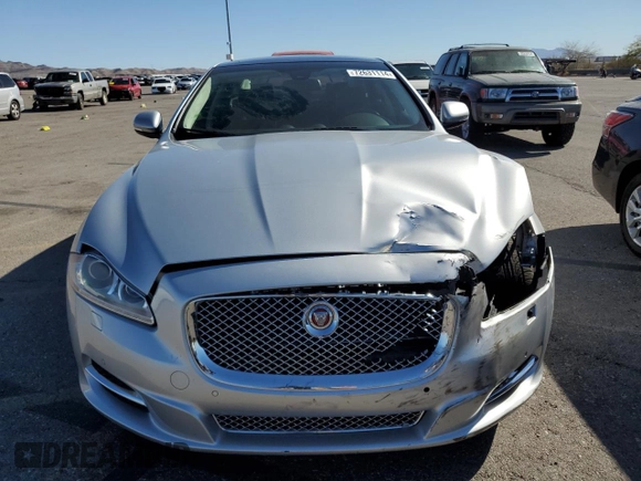 2015 Jaguar XJ with VIN SAJWA2GZ4F8V90853, listed as a Copart auction lot 72631114 with 59,237 mi miles and Salvage Title. Bid and sale history available at carsss.com. Image 5.