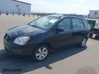 2007 Kia Rondo LX with VIN KNAFG525877029532, listed as a IAAI auction lot 42036604 with 225,698 mi miles. Bid and sale history available at carsss.com. Image 2.