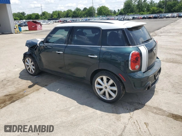 2013 MINI Countryman S with VIN WMWZC3C58DWP21965, listed as a Copart auction lot 61161735 with 142,797 mi miles and Salvage title. Bid and sale history available at DreamBid. Image 2.