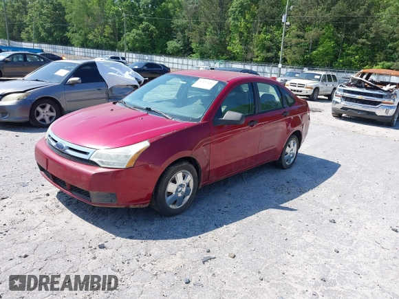 2009 Ford Focus S with VIN 1FAHP34N69W102568, listed as a IAAI auction lot 42137185 with 113,099 mi miles. Bid and sale history available at carsss.com. Image 2.