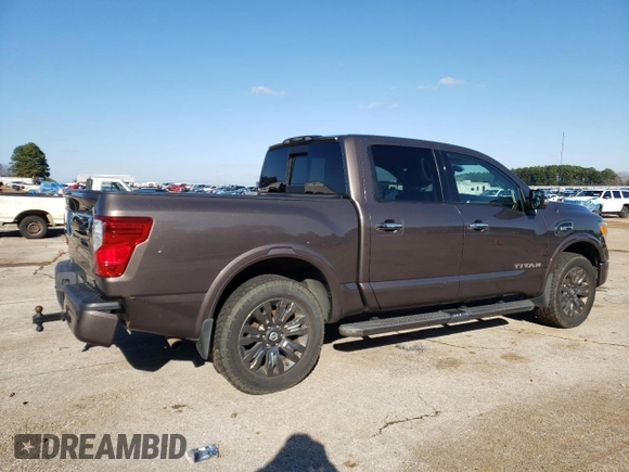 2017 Nissan Titan SL z VIN 1N6AA1E54HN512447, wystawiony jako Copart lot #85330734 z przebiegiem 119 424 mil mil oraz Czysty tytuł • Clean title. Historia ofert i sprzedaży dostępna na DreamBid. Obrazek 3.