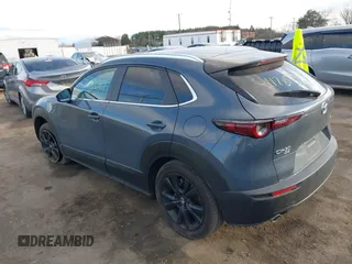 2023 Mazda CX-30 S Carbon Edition with VIN 3MVDMBCM1PM573317, listed as a IAAI auction lot 41785371 with 6,475 mi miles and . Bid and sale history available at DreamBid. Image 3.