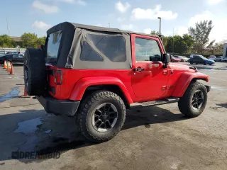 2011 Jeep Wrangler Sport with VIN 1J4AA2D17BL628066, listed as a Copart auction lot 51524285 with 105,854 mi miles and Clean Title. Bid and sale history available at carsss.com. Image 3.