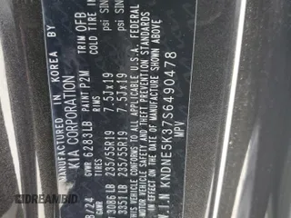 2025 Kia Carnival SX with VIN KNDNE5K37S6490478, listed as a Copart auction lot 51389565 with 6,929 mi miles and Salvage Title. Bid and sale history available at DreamBid. Image 15.