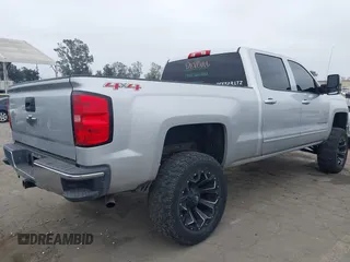 2015 Chevrolet Silverado 1500 LT with VIN 1GCUKREC7FF198486, listed as a IAAI auction lot 42131232 with 151,947 mi miles and . Bid and sale history available at DreamBid. Image 4.