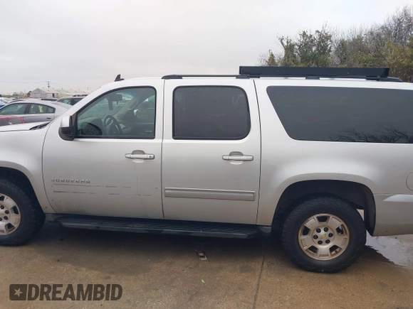 2014 Chevrolet Suburban LS with VIN 1GNSCHE08ER217393, listed as a IAAI auction lot 41563635 with 212,852 mi miles. Bid and sale history available at carsss.com. Image 14.