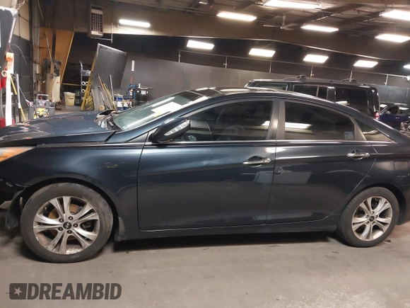 2012 Hyundai Sonata Limited z VIN 5NPEC4AC2CH459115, wystawiony jako IAAI lot #41984793 z przebiegiem 320 814 mil mil oraz . Historia ofert i sprzedaży dostępna na DreamBid. Obrazek 14.