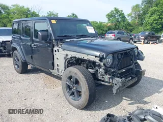 2020 Jeep Wrangler Unlimited Sahara High Altitude with VIN 1C4HJXEGXLW182581, listed as a IAAI auction lot 42612084 with 52,656 mi miles and . Bid and sale history available at DreamBid. Image 1.