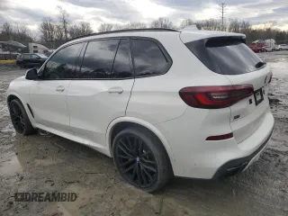 2020 BMW X5 M50i with VIN 5UXJU4C02L9C46464, listed as a Copart auction lot 43455805 with 89,337 mi miles and Salvage Title. Bid and sale history available at DreamBid. Image 2.