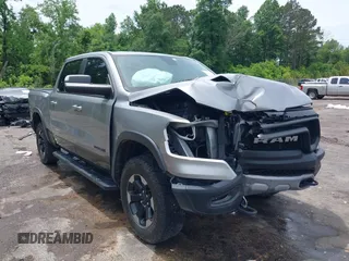 2020 Ram 1500 Rebel with VIN 1C6SRFLT8LN229872, listed as a IAAI auction lot 42135383 with 71,741 mi miles and . Bid and sale history available at DreamBid. Image 1.