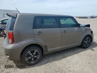 2012 Scion xB z VIN JTLZE4FE3CJ016375, wystawiony jako Copart lot #56891175 z przebiegiem 150 731 mil mil oraz Szkody całkowita. Historia ofert i sprzedaży dostępna na DreamBid. Obrazek 3.