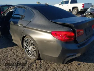 2019 BMW 5 Series M550i xDrive with VIN WBAJB9C50KB464159, listed as a IAAI auction lot 41758879 with 9,000 mi miles and . Bid and sale history available at DreamBid. Image 21.