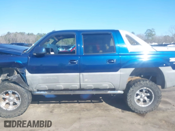 2002 Chevrolet Avalanche z VIN 3GNEC13T92G315409, wystawiony jako IAAI lot #41661553 z przebiegiem 167 410 mil mil oraz . Historia ofert i sprzedaży dostępna na DreamBid. Obrazek 14.