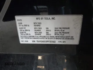 2023 Tesla Model Y Long Range with VIN 7SAYGAEEXPF707503, listed as a IAAI auction lot 41712166 with 27,467 mi miles and . Bid and sale history available at carsss.com. Image 9.