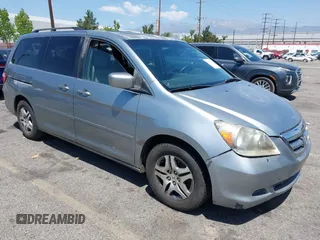2007 Honda Odyssey EX-L with VIN 5FNRL38777B016421, listed as a IAAI auction lot 42139239 with 286,558 mi miles. Bid and sale history available at carsss.com. Image 1.