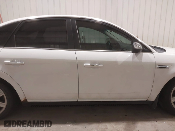 2008 Ford Taurus Limited with VIN 1FAHP25W28G173633, listed as a IAAI auction lot 40994885 with 133,974 mi miles. Bid and sale history available at carsss.com. Image 13.