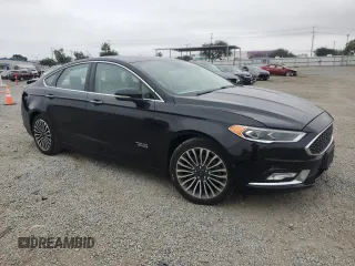 2017 Ford Fusion Titanium z VIN 3FA6P0SU5HR105415, wystawiony jako Copart lot #59779715 z przebiegiem 88 988 mil mil oraz Szkoda całkowita • Salvage title. Historia ofert i sprzedaży dostępna na DreamBid. Obrazek 4.